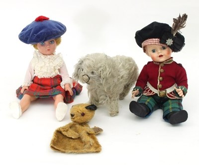 Lot 580 - Two toy dolls dressed in Scottish costume, an...