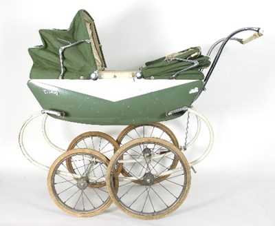 Lot 591 - A Triang twin pram with green hood and green...