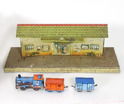 Lot 595 - A tinplate switchback train with track, two...