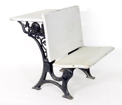 Lot 604 - A child's white painted desk/seat on a pierced...