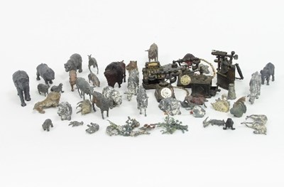 Lot 615 - A collection of lead animals, a miniature...