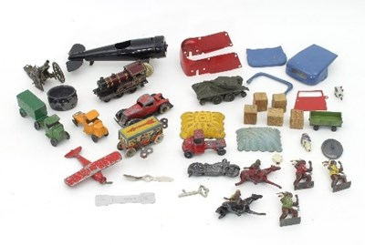 Lot 619 - A group of tinplate toys to include a Triang...