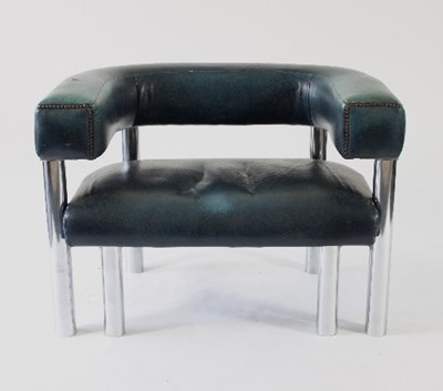 Lot 15 - A leather upholstered tub style armchair with...