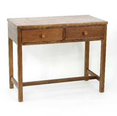 Lot 22 - A Gordon Russell oak two-drawer desk on square...