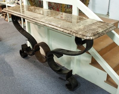 Lot 38 - A pair of very large wrought iron console...