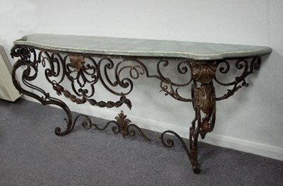 Lot 39 - A wrought iron console table, the scrolling...