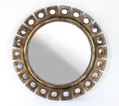 Lot 56 - A large circular mirror, the bronzed frame set...