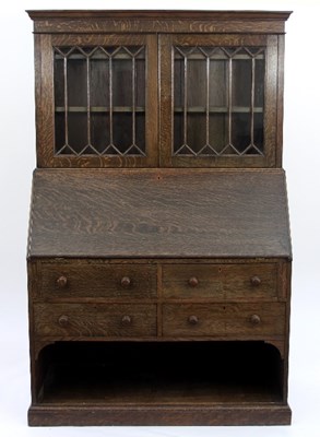 Lot 80 - A Heals oak bureau bookcase with glazed panel...