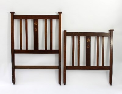 Lot 88 - An Arts & Crafts oak head and footboard for a...