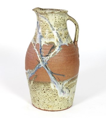 Lot 107 - A large stoneware jug, part glazed in cream,...