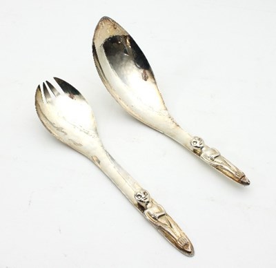 Lot 349 - A pair of white metal salad servers by Acme...