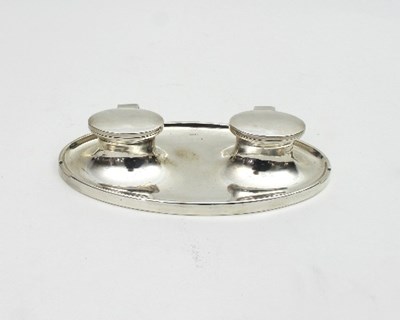 Lot 354 - An oval silver ink stand, A & J Zimmerman,...