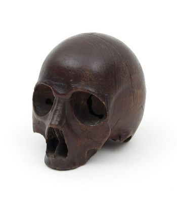 Lot 361 - A finely carved model of a skull, 6cm high