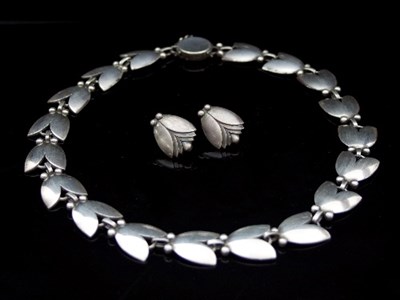 Lot 380 - Georg Jensen: a silver 'Tulip' necklace and...