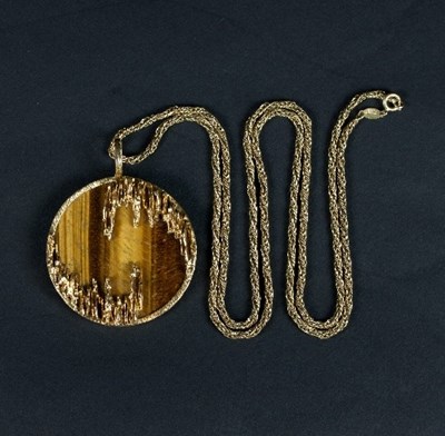 Lot 392 - Kutchinsky: a tiger's eye and 18ct gold...