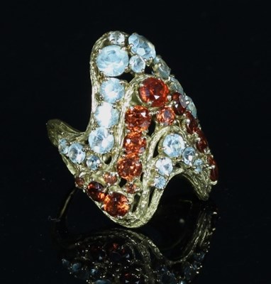 Lot 393 - H Stern: an aquamarine and garnet ring of...