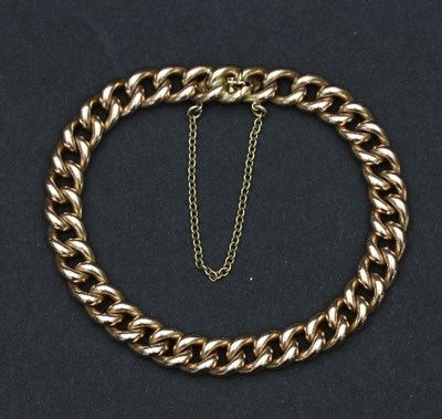 Lot 413 - A 15ct gold curb link bracelet, stamped 15 to...