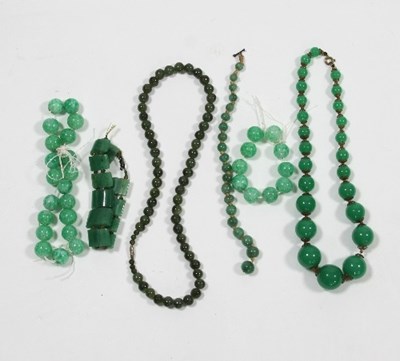 Lot 448 - A quantity of jade necklaces, bracelets etc.