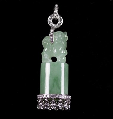 Lot 452 - A jade and diamond pendant, modelled as a...