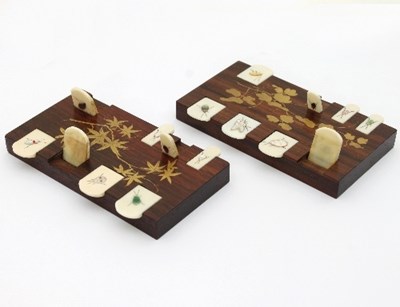 Lot 460 - A pair of Japanese shibayama whist counters,...