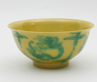 Lot 476 - A Chinese green and yellow glazed bowl,...