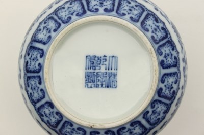 Lot 477 - A Chinese blue and white spittoon, bearing...