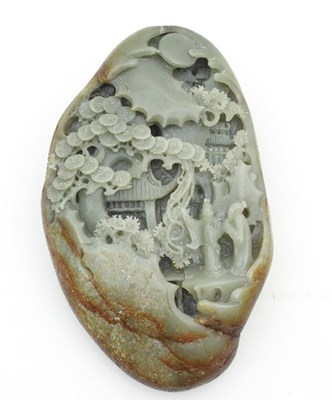 Lot 482 - A nephrite jade boulder carved with figures in...