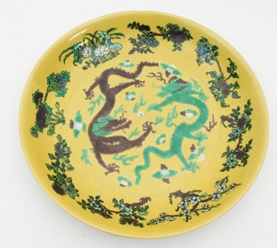 Lot 483 - A Chinese green, aubergine and yellow shallow...