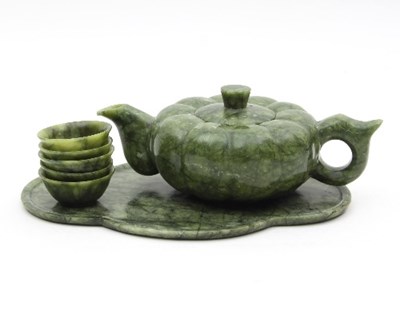 Lot 487 - A Chinese carved jadeite tea set, comprising...