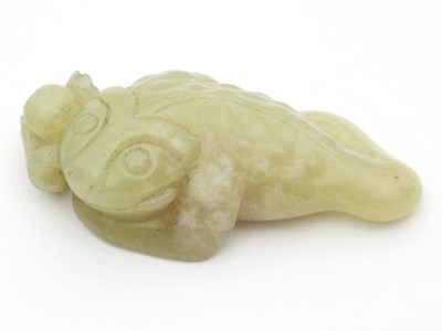 Lot 493 - A Chinese yellow jade carving of a toad and...