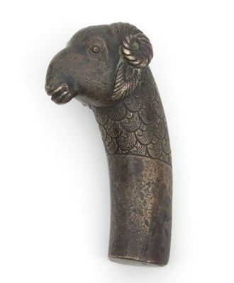 Lot 505 - A Mughal bronze ram's head cane topper or...