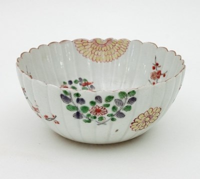 Lot 517 - A late 17th Century Japanese Imari ribbed bowl,...