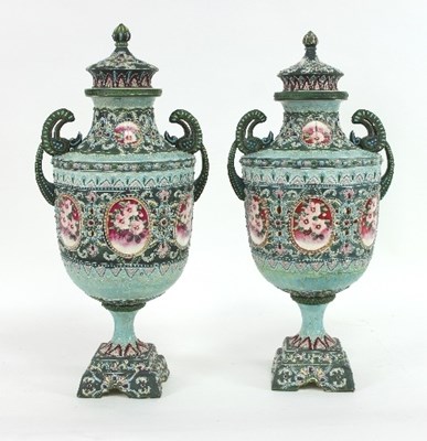 Lot 552 - A pair of Japanese urns and covers with floral...