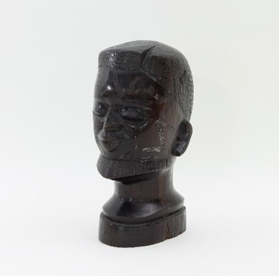 Lot 570 - A carved hardwood tribal bust, Tanganyika mid...