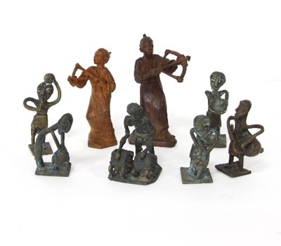 Lot 574 - Two tribal carved wood figures of archers,...