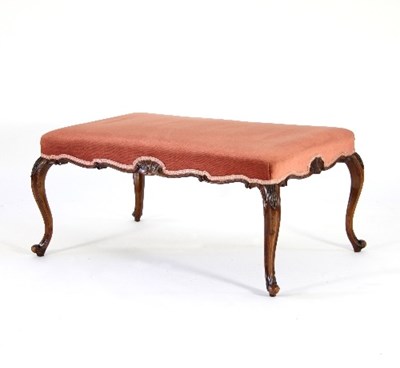 Lot 676 - A late 19th Century walnut stool on cabriole...