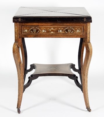 Lot 679 - An Edwardian inlaid gaming table, with four...