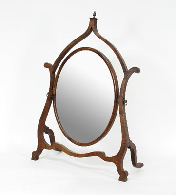 Lot 698 - A mahogany scroll frame oval dressing table...