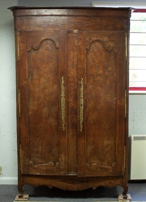 Lot 705 - A French provincial elm and chestnut armoire,...