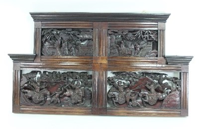 Lot 709 - A Chinese hardwood overmantel, carved and...