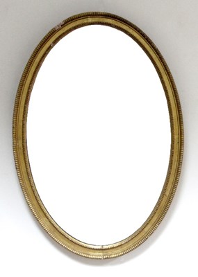 Lot 741 - An oval gilt mirror