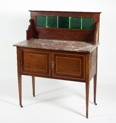 Lot 744 - An Edwardian mahogany inlaid washstand with...