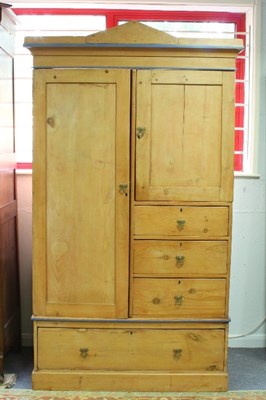 Lot 746 - A pine wardrobe, fitted an arrangement of...