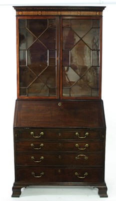 Lot 748 - A mahogany and inlaid bureau bookcase, the...