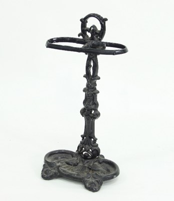 Lot 765 - A cast iron two-division stick stand with...