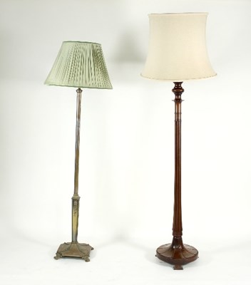 Lot 772 - A turned wood standard lamp with reeded column...