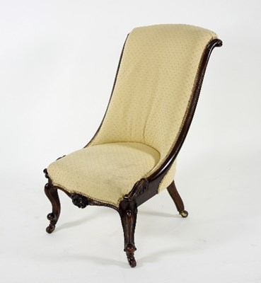 Lot 778 - A mid Victorian nursing chair, the walnut...