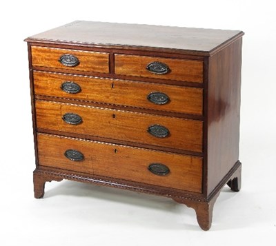 Lot 787 - An early 19th Century mahogany chest, with...