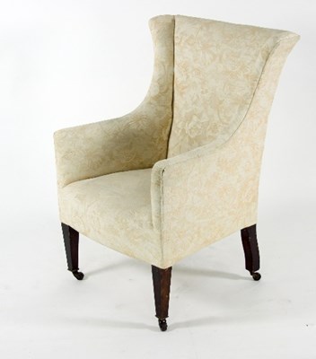 Lot 789 - A Victorian wingback armchair on square taper...