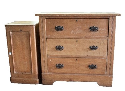 Lot 802 - A pine chest of three drawers, 92cm wide and a...